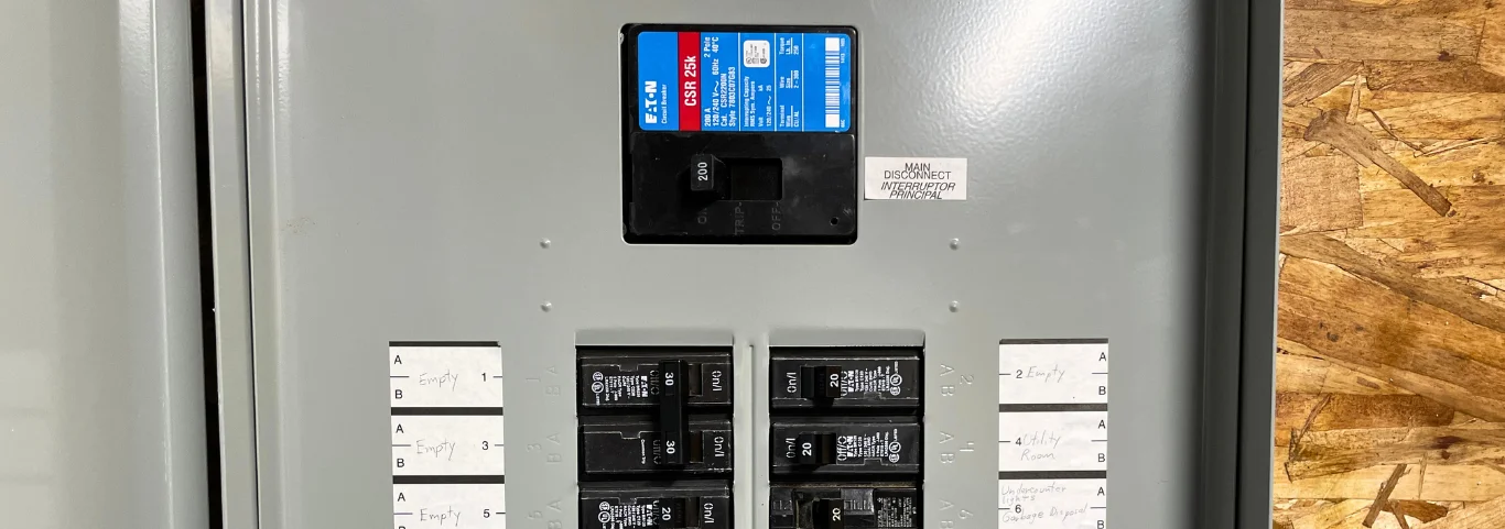 Eaton Cutler-Hammer 200A main panel with breakers, used to identify the correct Eaton Cutler-Hammer interlock kit
